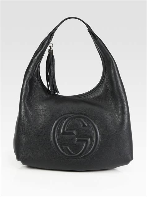 gucci bags black gucci and cream pattern|large leather Gucci handbags.